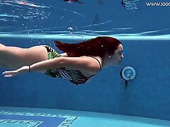 Diana Rius with hot tits touches her body underwater